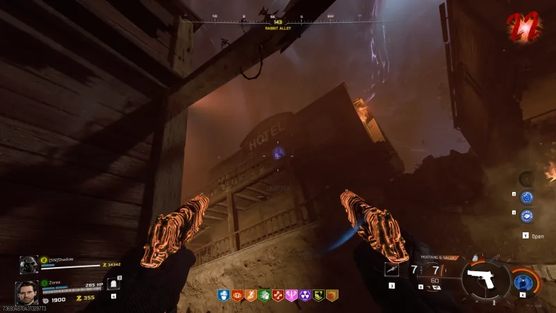 Mr Peeks on the balcony railing under the Hotel sign in Ashwood on Ashes of the Damned