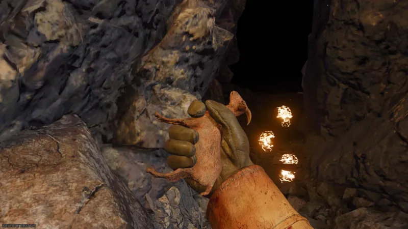 Holding a Molotov near the cave entrance at Abyssal Rim with fire trail leading into darkness