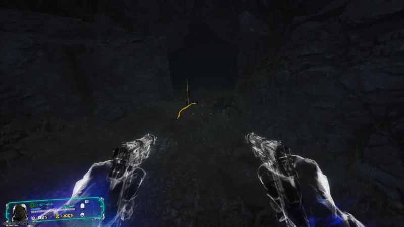 A faint yellow marker glows on the ground in a dark cave passage during the quest.