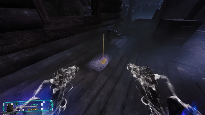 A small glowing item sits on a wooden floor beside a body in a dark attic-like room.