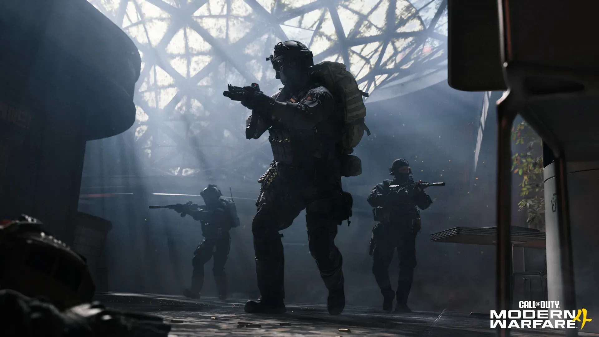 MW4 operators advancing through a building in tactical formation