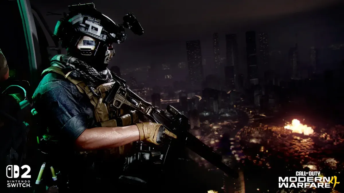An operator overlooking a burning night-time city, captured on Nintendo Switch 2 in Modern Warfare 4