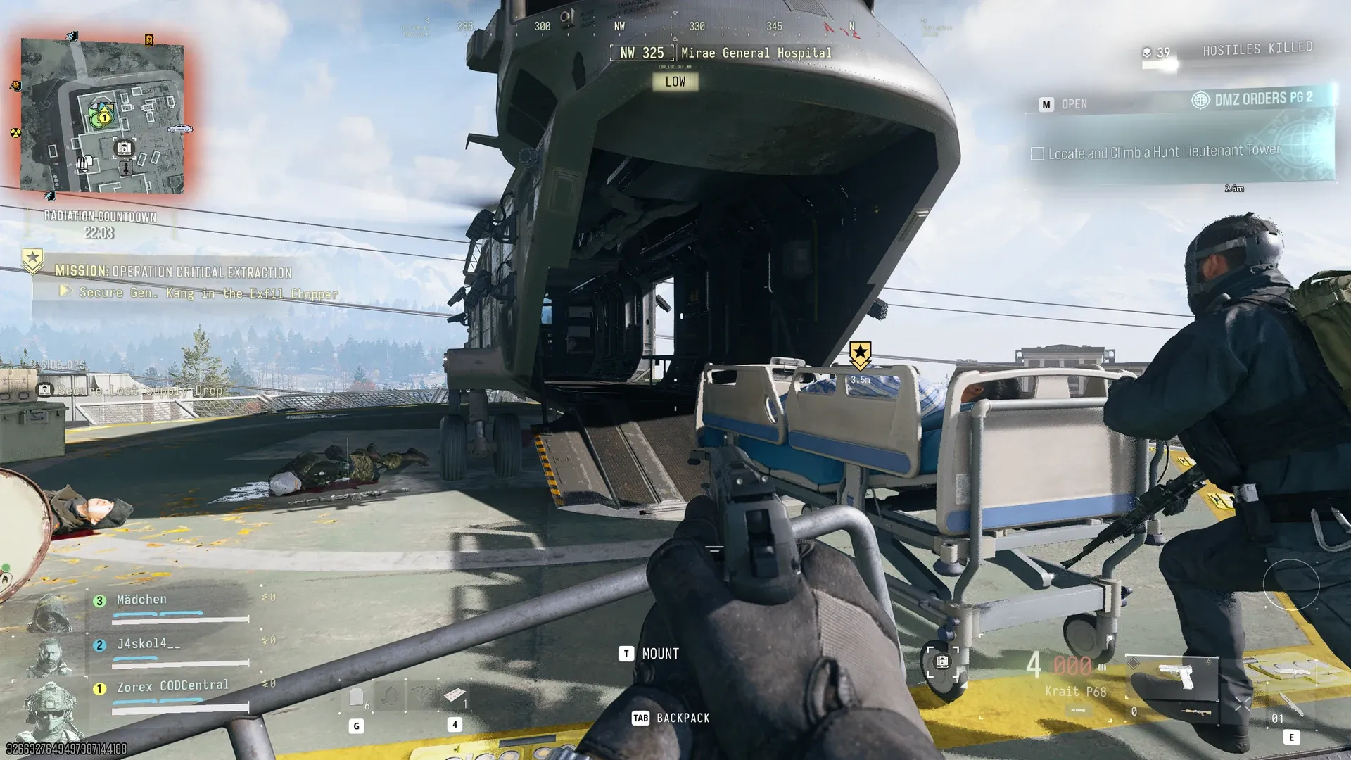 Squadmate pushing General Kang's hospital bed across the hospital helipad toward the exfil chopper in Operation Critical Extraction